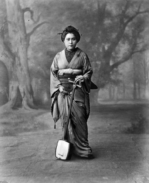 Portrait of woman with musical instrument