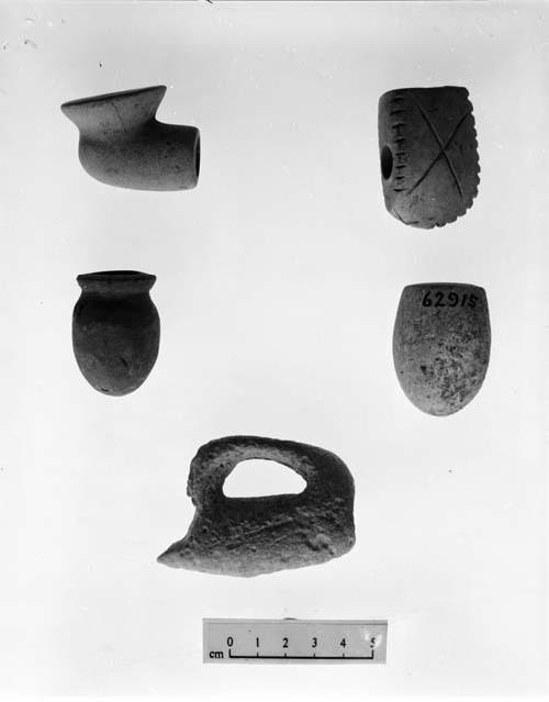 Disk pipe/"keel shaped" pipe, engraved/vasiform pipe/globular-shaped pipe/swan effigy pipe