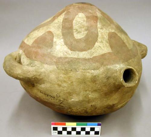 Large red on white pottery canteen