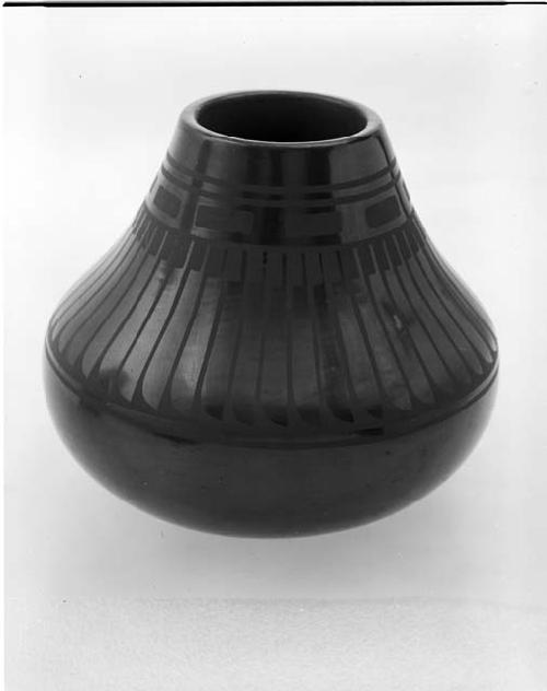 Black-on-black shouldered vase; feather motif