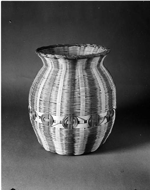 Waste basket, honeysuckle and white oak