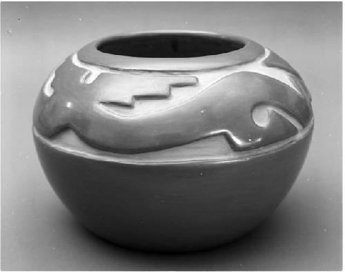 Carved red bowl; avayanu motif