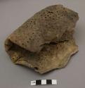 Large piece of goatskin (?) punched full of holes - perhaps a strainer