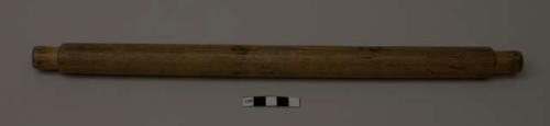 Stick, "collected by E.C. Parsons" written on bottom right corner of stick in black pen. "M ? A" carved into bottom right corner of stick.