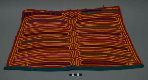 Mola, red ground with pink, yellow, green, blue, black appliqué