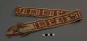 Waistband, light tan ground, two red-orange bands and central woven design