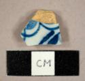 Handpainted blue on white tin glazed earthenware sherd