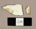 Pearlware sherds, including one blue feathered edge rim to a plate