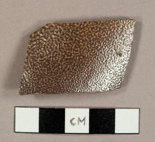 Stoneware sherd with brown salt glaze on the exterior