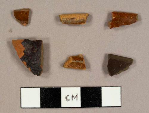 Miscellaneous lead-glazed redware sherds, including a Jackfield-type ware sherd, a Jackfield ware bowl rim sherd, and a Border ware bowl rim sherd