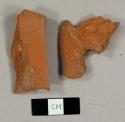 Brick tile fragments, including one with hole