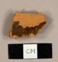 Refined redware sherd with brown lead glaze on interior