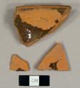 Refined redward sherds with led glaze on interior, including one bowl rim sherd