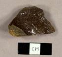 Coarse redware sherd with salt-glazed interior, possibly a plumbing pipe