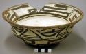 Bowl, polacca polychrome style c. int: linear design; ext: zuni rain bird design