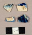 Pearlware sherds, including one blue shell-edged plate sherd, two blue transfer print sherds, and one possible annular ware sherd