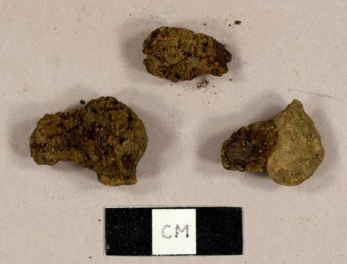 Metal fragments, including at least one possible nail