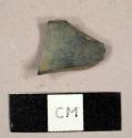 Burned sherd of a white kaoline pipe bowl