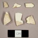 Creamware sherds, including one with no glaze remaining