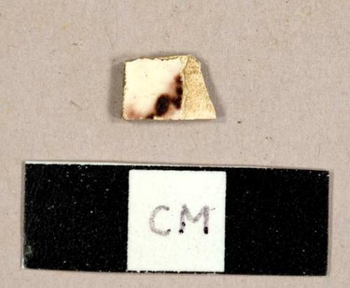 Whieldon ware sherd with manganese spattering on one side