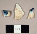 Blue shell-edged pearlware rim sherds to a plate