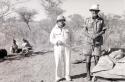 Laurence Marshall and Claude McIntyre standing in the expedition camp