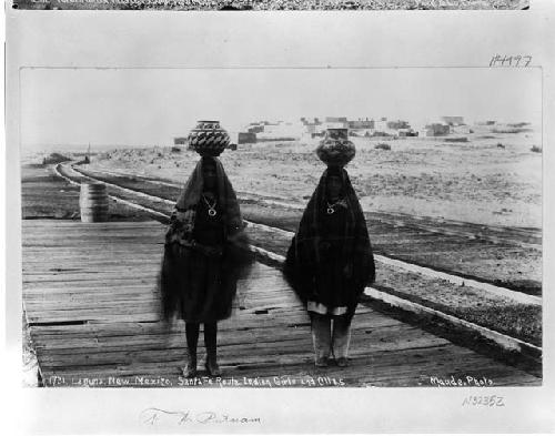 Indian girls and Ollas, Laguna, New Mexico; Santa Fe Route. Original photo by Maude, prior to 1901.
