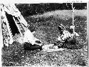 Mr. and Mrs. Christopher Morris playing the waetes' tag'n-a; Micmac bowl and dice game