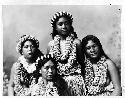 Four women with leis