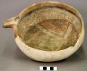 Polychrome pottery bowl with spout (handle?), restorable
