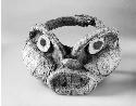 Head-piece in form of animal head covered with painted bark cloth