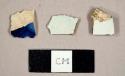 Pearlware sherds, one with blue glaze on one side and one possibly flow blue