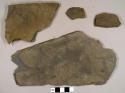 Slate and Cambridge mudstone, including possible roof tile fragments