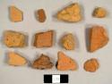 Brick fragments, including possible unglazed, worn redware sherds