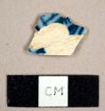 Pearlware sherd with blue and white decorations, possibly handpainted