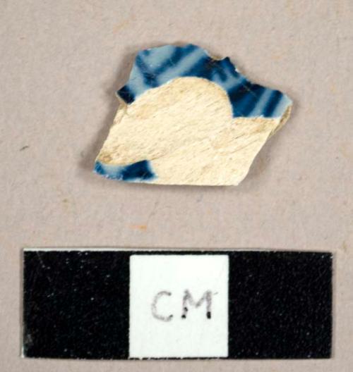 Pearlware sherd with blue and white decorations, possibly handpainted