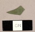 Plastic, possibly burned green flat glass fragment