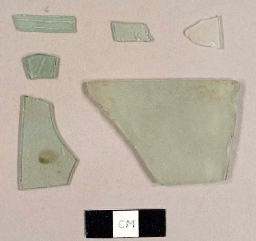 Colorless and aqua flat glass fragments