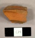 Unglazed refined redware rim sherd to a pitcher or storage jar