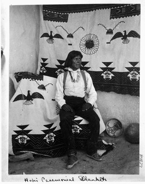 Hopi man with ceremonial blanket