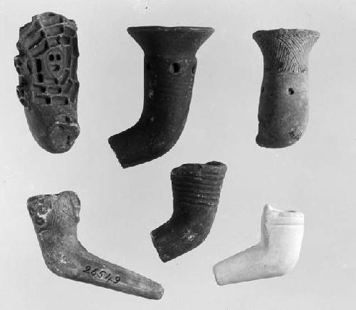 Plaster casts of pottery pipes