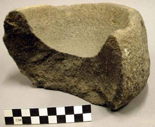 Ground stone mortar, broken