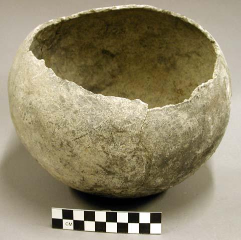 Globular pottery jar - restored