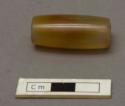 Ground stone bead