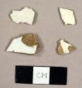 Miscellaneous earthenware sherds, including two creamware sherds, one whiteware sherd, and one ironstone sherd