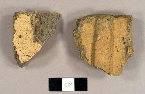 Yellow brick tile fragments, possibly roofing