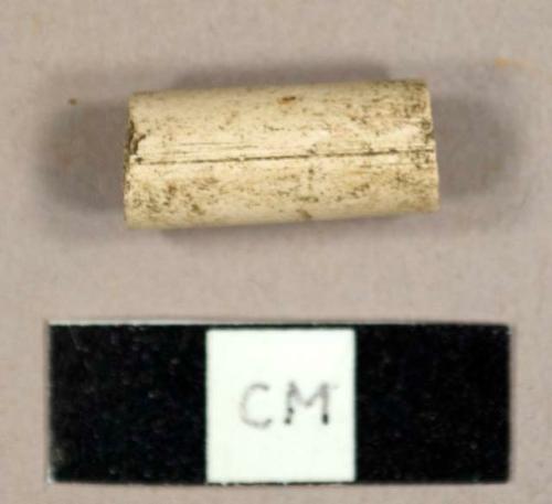 White kaolin pipe stem fragment