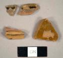 Lead glazed refined redware sherds, including two rim sherds of a bowl or pan that mend together