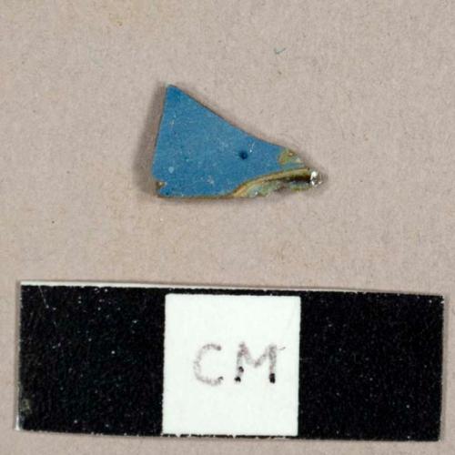 Annular ware sherd with blue glaze and green, yellow, and brown marbelized/trailed decoration