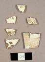 Creamware sherds, including one rim sherd to a cup